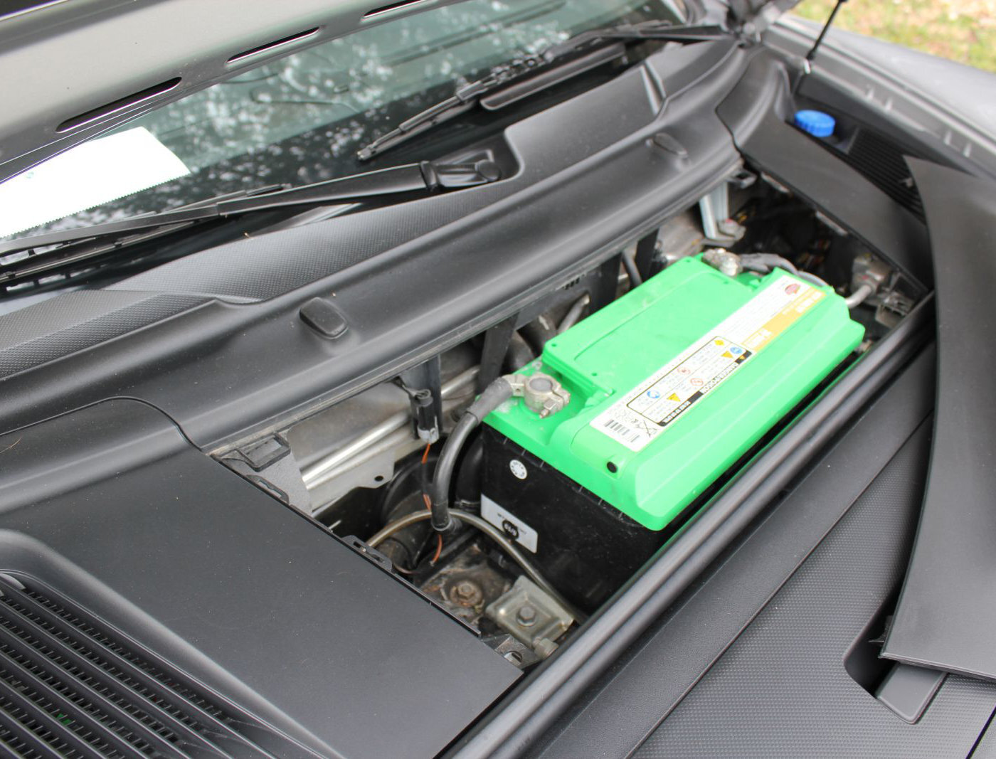 (Sample) The engine compartment from a 2009 Porsche Cayman